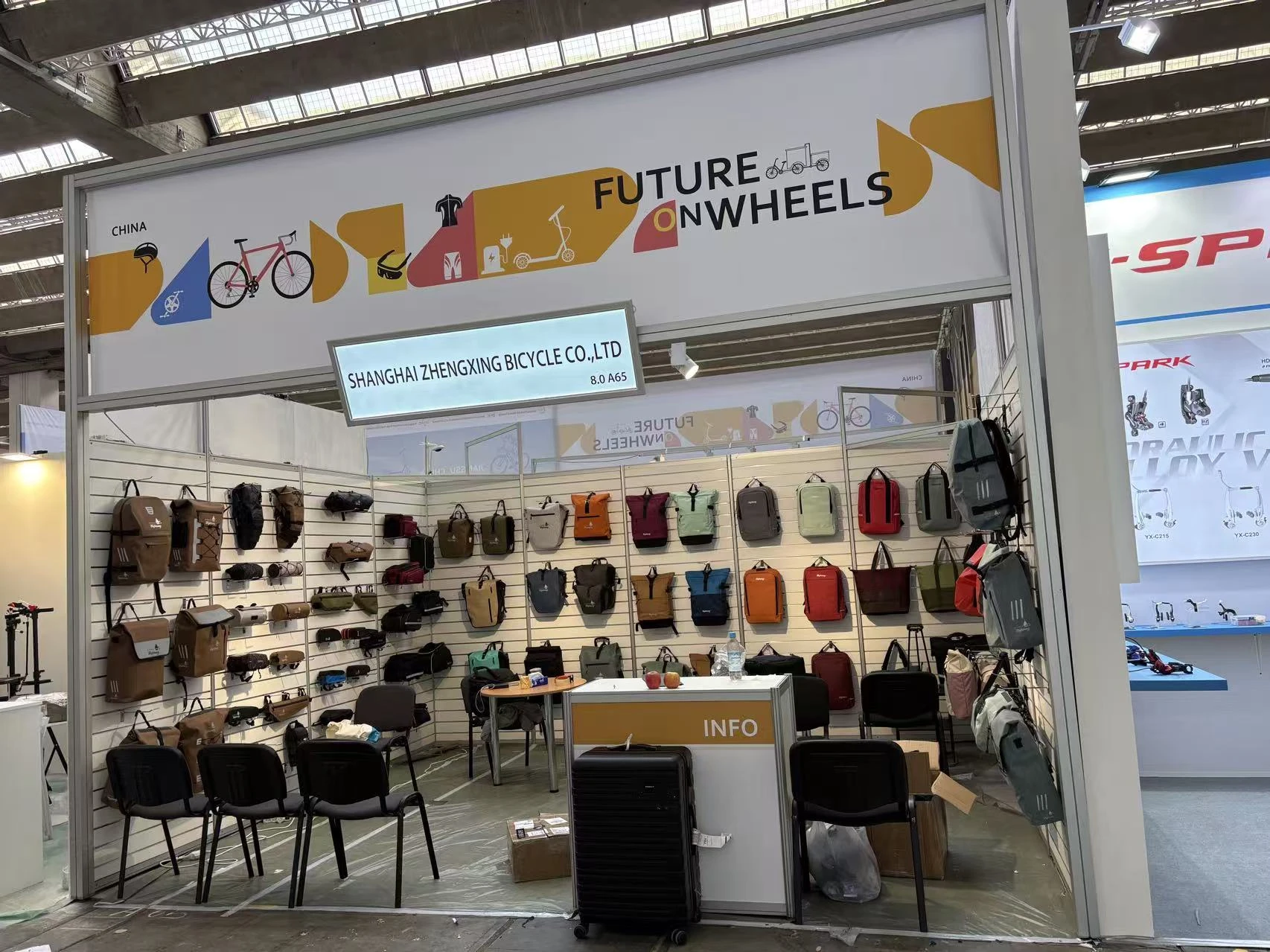 Shanghai Zhengxing Bicycle Co., Ltd. exhibition booth at EUROBIKE 2026, stand 8.0 A65, displaying bicycle bags